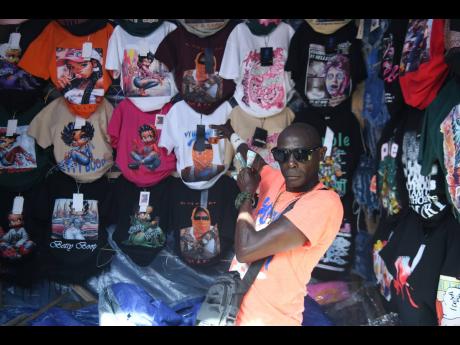 Credit: Matthew McKoy Triple 6 shows off the items he is selling for the season.