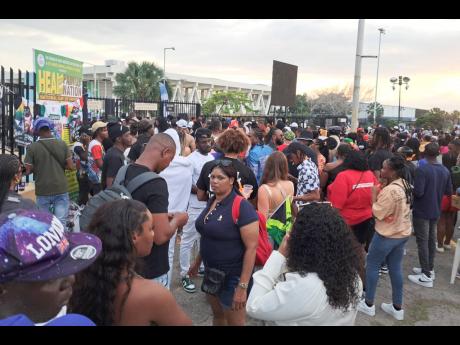 Credit: Nathaniel Stewart Patrons waiting to enter the National Stadium before the start of Freedom Street.