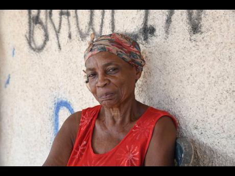 Credit: Antoine Lodge Port Royal resident Catherine Cather says she is happy that she will no longer have to walk with heavy pans filled with water.