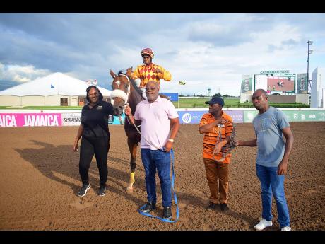 STRONG MIND, with Reyan Lewis aboard,  parades with his connections after winning the MISS RUTH Trophy over 6 1/2 furlongs as part of the BGLC/TOBA 2YO MILLIONAIRES SERIES - RACE #4, at Caymanas Park on Sunday, December 15, 2024.