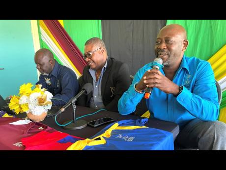 Jamaica Cricket Association (JCA) First Vice-President Fritz Harris (right) addresses the media at the launch of the JCA Dream XI T10 tournament at Sabina Park yesterday. Looking on are  JCA CEO Courtney Francis (centre) and  JCA Operations Manager Oniel Cruickshank.