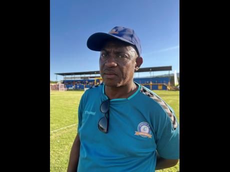 Credit: Ashley Anguin Andrew Edwards, coach of Manchester High School, during an ISSA/Burger King rural U14 football match at St Elizabeth Technical High School on December 17, 2024.