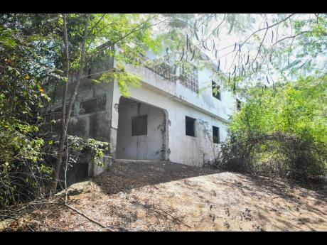 Credit: Matthew McKoy Photos An eerie stillness blankets the abandoned mansion.