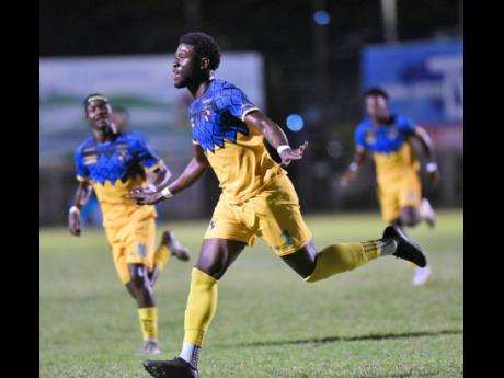 Racing United’s Ronaldo Biggs celebrates after scoring against Harbour View in their Jamaica Premier league football match at Anthony Spaulding Sports Complex last night. Racing won 1-0.