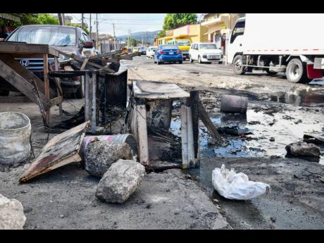 Credit: Matthew McKoy Some of the debris that was earlier used to block the road.