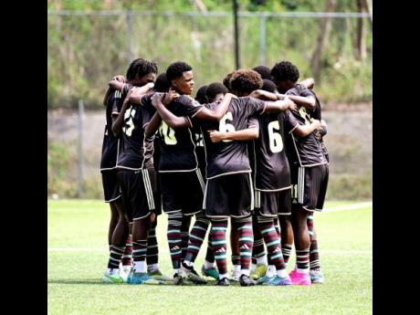 Credit: Gladstone Taylor Jamaica’s under-17 players huddle ahead of the start of the second half of a friendly international against Trinidad and Tobago’s under-17s at the UWI-JFF Captain Horace Burrell Centre of Excellence at UWI, Mona, in St Andrew on Sunday, May 5, 2024. Jamaica defeated Trinidad and Tobago 2-1. The team is set to depart on Saturday to participate in the Concacaf Men’s Under-17 Qualifiers.