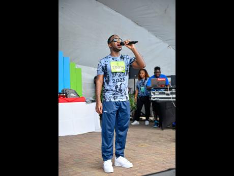 Nigy Boy performing at the Sagicor Sigma Corporate Run yesterday in New Kingston.
