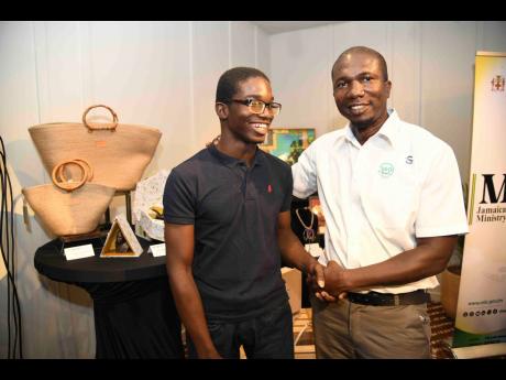 Credit: Antoine Lodge Photos Ajalon Cole (left) said he was inspired by his dad Scheed Cole.