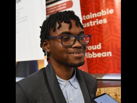 Credit: Ian Allen/Photographer Carlton Bucknor, a third-year computer science student at the University of Technology, Jamaica.