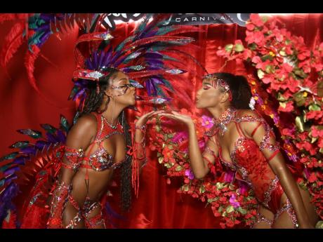 Credit: Nathaniel Stewart Campari Carnival launch event costume models Xodus' Lianne Fullwood (left) and Yard Mas Carnival's Chante-Marie Samlal.