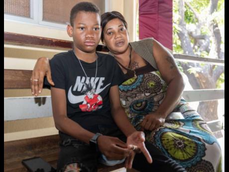 Credit: Gladstone Taylor Eherone Dawson and her 15-year-old son Nickoy Dixon, who suffers from chronic kidney disease.