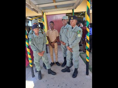 Credit: Rasbert Turner Members of the Dinthill Technical High School cadet group looking sharp at Career Day recently.