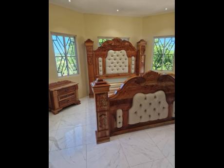 Credit: Contributed Every curve and corner of this bed reflects the skill passed down through generations.