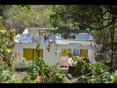 Credit: Ian Allen One of the many abondoned houses in Bito.