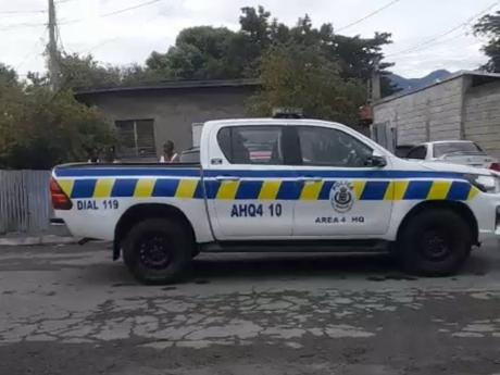 Credit: Andre Williams Police at the scene of a fatal shooting of a man by cops in St Andrew on April 16.