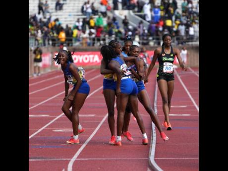 Hydel High School’s athletes celebrate winning the final event of the Penn Relays, the Championships of America 4x400-metre relays at the Franklin Field Stadium in Philadelphia, Pennsylvania, on Saturday.