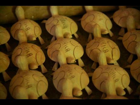 Wooden turtles, carved in Ipswich, capture the spirit of Jamaica.