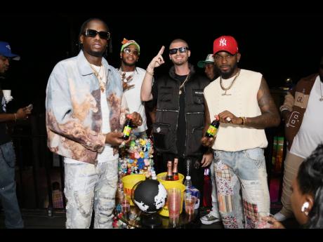 From left: Man of the Hour, Ding Dong, holds a vibe with artiste Popeye Caution, producer Felipe Andres Vargas Mediavilla, known as Felva and Dimelo Felva, and Kemar Highcon. 