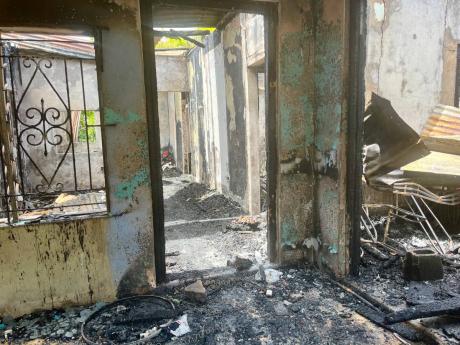 Credit: Ashanti Lawson Photos The burnt-out husk of the Anderson family home following Sunday morning’s fire.