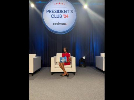 Credit: Contributed Optimum Jamaica employee Felicia Bedward handed over the donation to Yutes4Change.