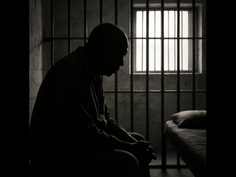 Credit: ChatGPT Image AI-generated image of a man behind bars.