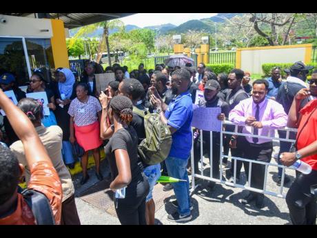 Credit: Matthew McKoy Protesters cry out for justice for UTech, Jamaica, student Anisa Dilworth, who is believed to have been killed after disappearing on May 6.