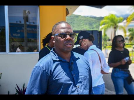 Credit: Matthew McKoy Anisa’s father Everton Dilworth speaks to reporters at the protest.