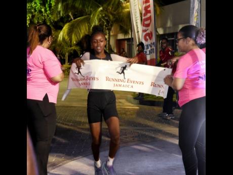 Credit: Ashley Anguin Papine High School’s 15-year-old, Gizelle James, winner of the female section of the Guardian Group SHINE 5K Night Run/Walk at Harmony Beach Park in Montego Bay on Saturday.