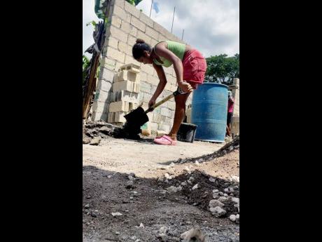 Credit: Contributed Douglas putting in the work on a construction site.