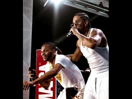 Credit: Image by soigne.shutters Dexta Daps (left) and Trey Songz share the stage at Mocha Fest on Sunday.