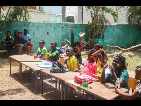 Credit: Contributed Students answer questions during a Teach the Youth session.