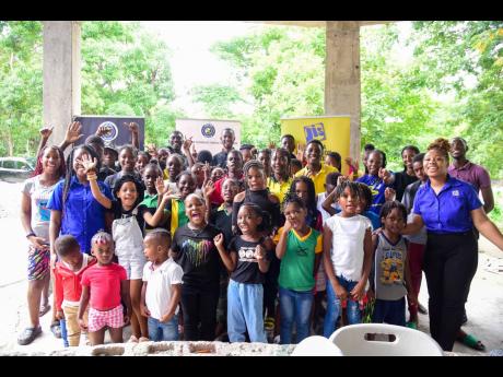 Credit: Contributed Volunteers, students and UTech participants during a Teach the Youth event.