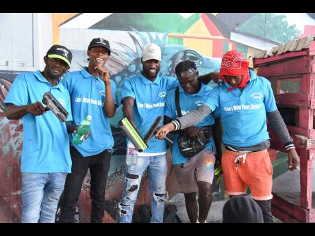 Credit: Ian Allen Members of the newly formed Three Miles Windshield Wipers Association.