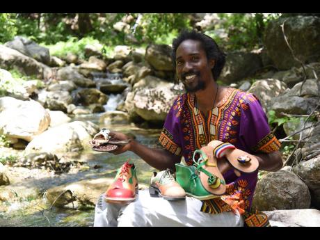 Credit: Ian Allen Despite high production costs, Bonner is determined to keep his business, Love Drumz Sandalz, going.