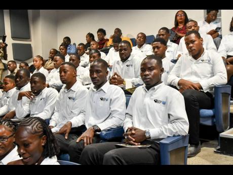 Some of the 48 young people who have been equipped with the technical skills and professional discipline under the Jamaica National Service Corps’ (JNSC) Skills Track for Workforce Development programme.