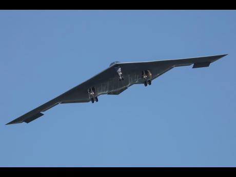 Credit: David Smith A B-2 bomber arrives at Whiteman Air Force Base Missouri on Sunday. (AP Photo/David Smith)