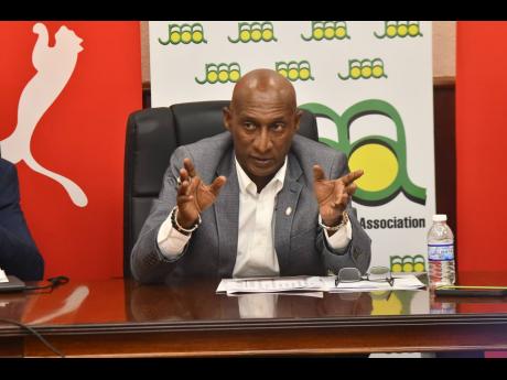 Jamaica Athletics Administrative Association President Garth Gayle addresses the media during the launch of the National Junior and Senior Athletics Championships at the organisation’s headquarters in Kingston yesterday.