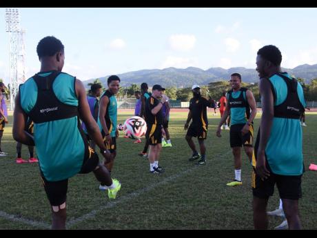 Credit: Ashley Anguin Jamaica’s Reggae Boyz warming up ahead of a training session at the Montego Bay Sports Complex. The Reggae Boyz will face Panama in a crucial Concacaf Gold Cup football match today.