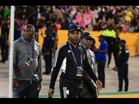 Cavalier’s Under-17 head coach Everdean Scarlett (right) with the club’s Sporting Director Rudolph Speid (centre) and coach David Laylor.