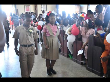 Students of Chetwood Memorial Primary School in St James participate in their graduation exercise, held at the Blessed Sacrament Cathedral in Montego Bay, on Tuesday. 