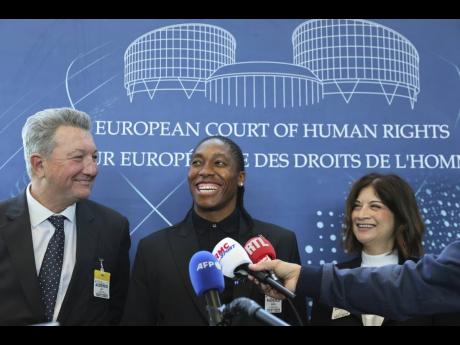 Credit: AP South Africa’s Caster Semenya (centre) answers reporters with lawyers Gregory Nott (left) and Shona Jolly KC yesterday. Semenya won a partial victory at the European Court of Human Rights in her seven-year legal fight against track and field’s sex eligibility rules in Strasbourg, eastern France.