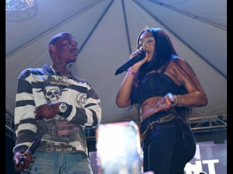 Credit: Ashley Anguin Dancehall star Valiant joins Stalk Ashley on stage to perform their song 'Narcissistic' at Reggae Sumfest Blitz All-Black event.