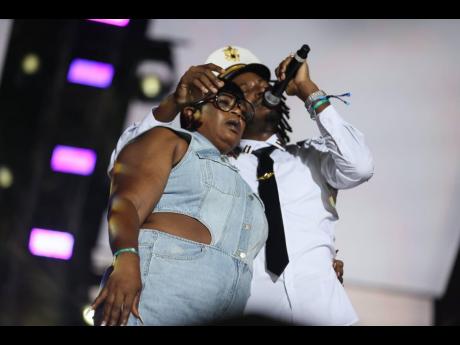 Govana (right) embraces his mom, Sonia Eccleston, after gifting her a Honda CR-V. 