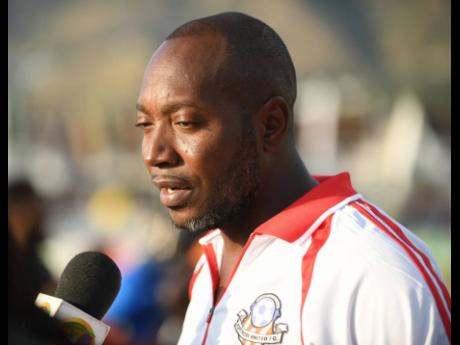 Head coach of Arnett Gardens, Phillip Williams.