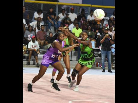 Credit: File Manchester Spurs’ Zaudi Green (right) and St Ann Orchids’ Tasheka Reid chase the ball during their Red Stripe Flavours Netball Jamaica Elite League semi-final playoff match at the Leila Robinson Courts recently.