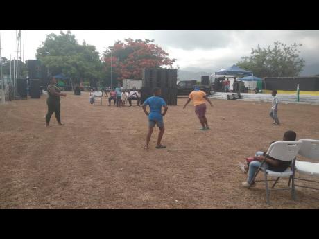 Credit: Contributed Residents of Hermitage in rural St Andrew participate in a game of dandy shandy at the community’s annual event, held yesterday, Independence Day.