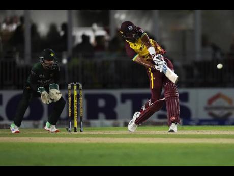 Credit: AP Roston Chase plays a shot during the one-day international cricket match against Pakistan.
