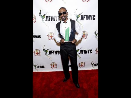 Christopher Martin shows off his latest accolades at the Jamaica Independence Foundation, Inc. ‘The People’s Ball’ in New York on August 9. 