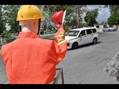 Credit: Rudolph Brown Some residents say the robot being used in the community is a good look.