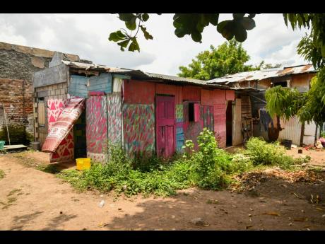 A house in the tattered tenement yards that will be replaced by modern apartments in 12 months.
